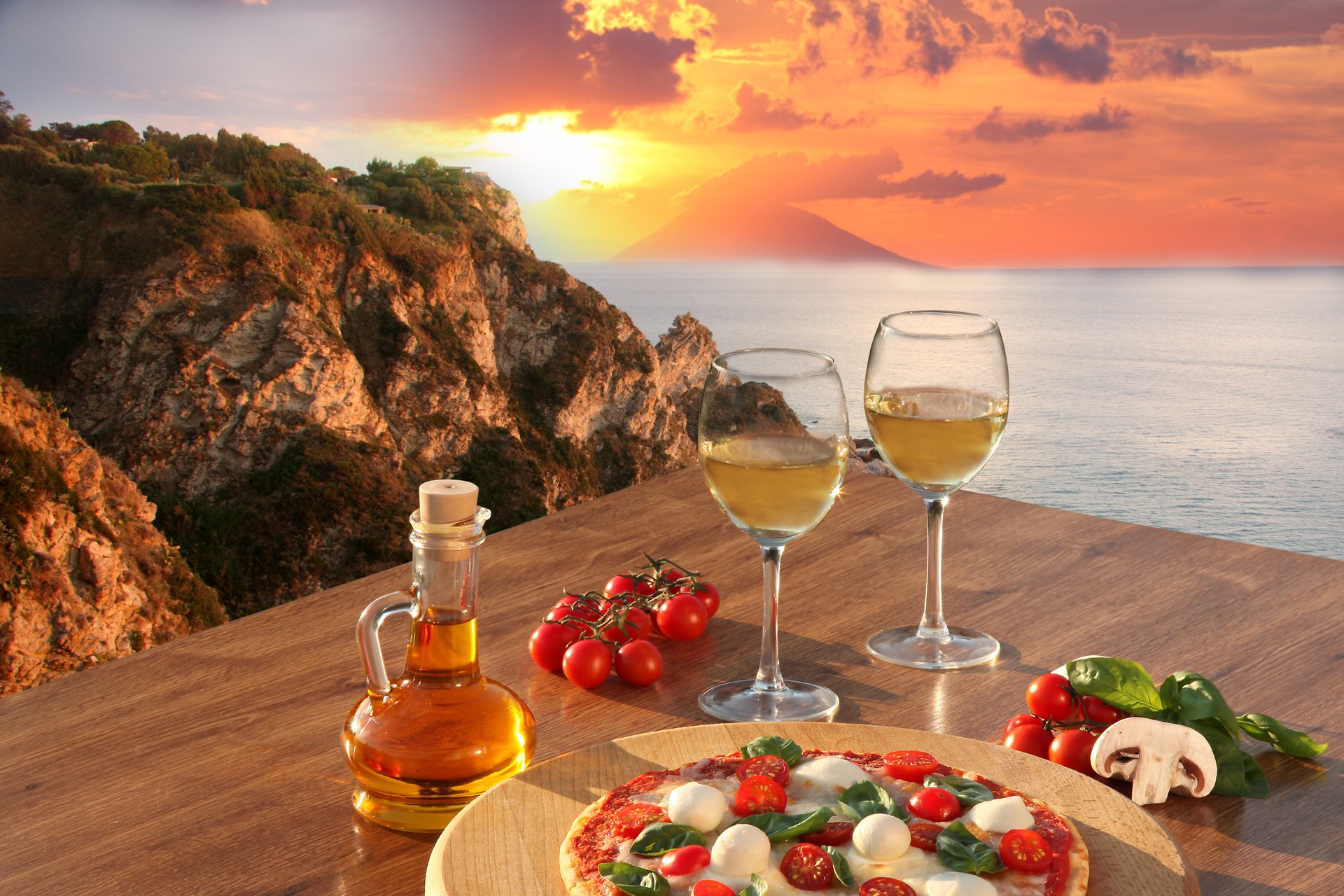 Calabria coast with  Italian pizza and glasses of wine,Italy